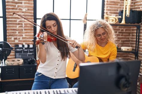 Women playing Kissoro in Boukaya