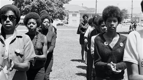 Women wearing their natural hair in the Black Panther Party circa 1970